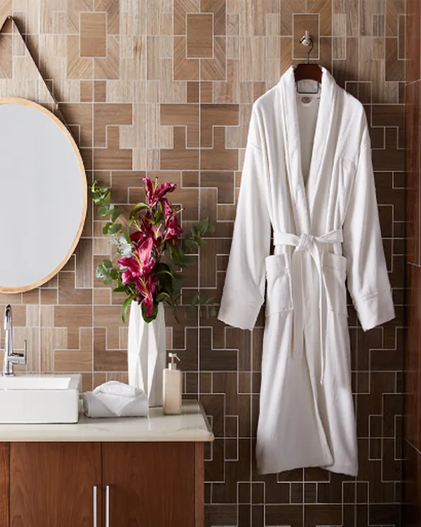 White cotton bathrobe on a hanger